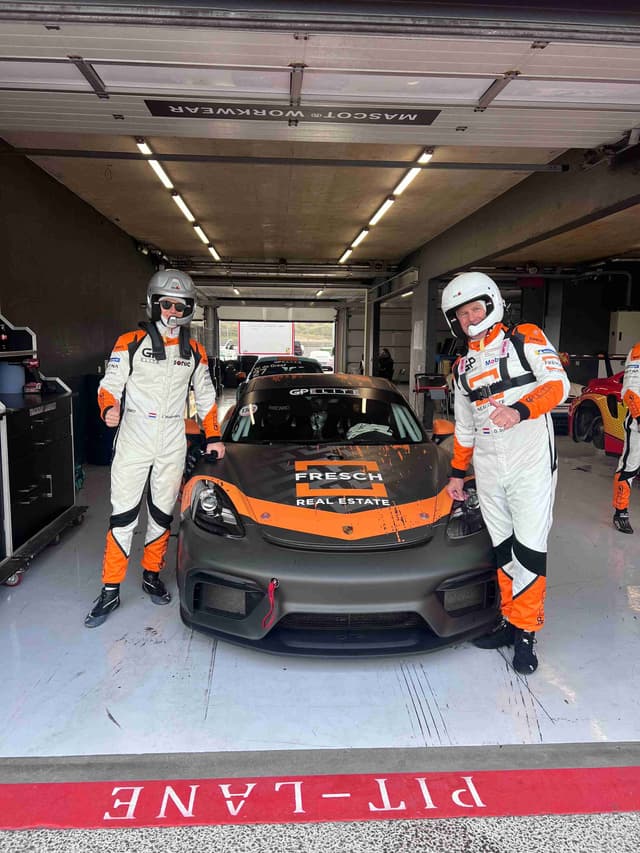 Professional McLaren GT racing team in garage